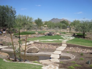 Turf, water feature and custom golf putting greens