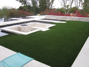 Elegance with sythetic grass and fabulous water features