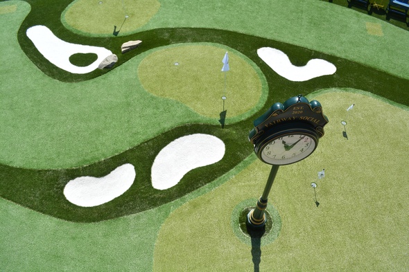 Phoenix Synthetic grass golf course with sand traps and golfers