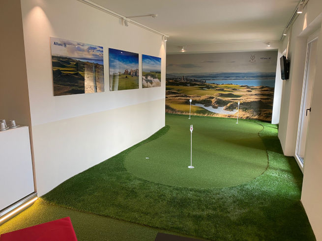Phoenix indoor putting green in an office with scenic wall art