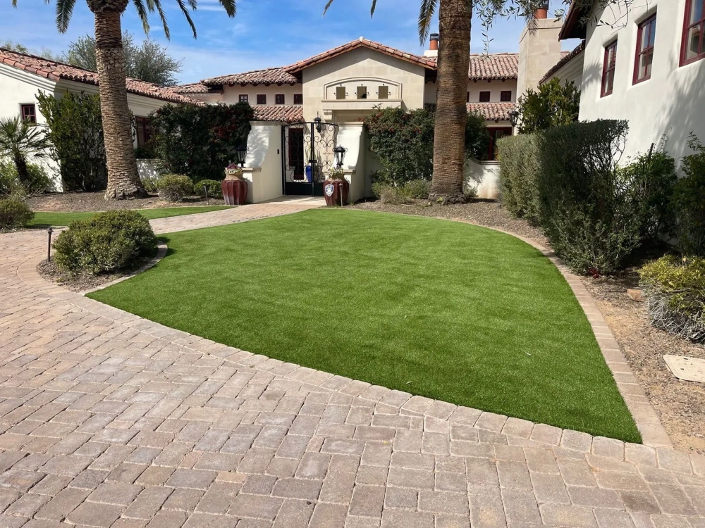 artificial turf in a front yard with a house