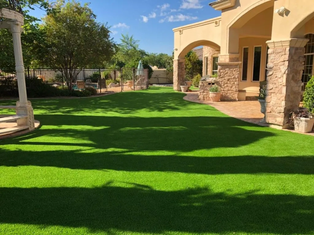 artificial turf in a front yard with a house