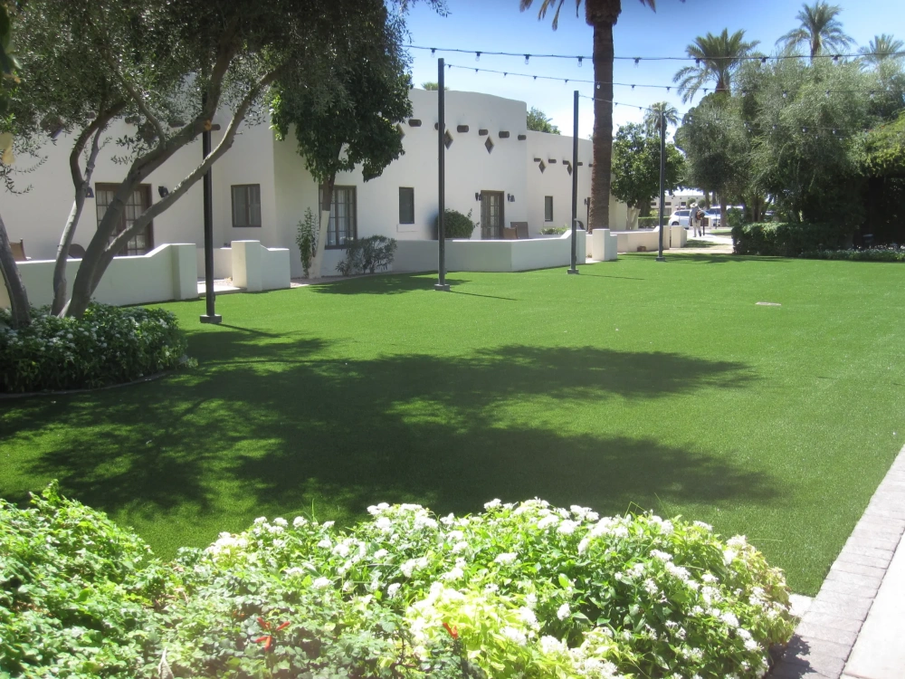 artificial turf in a front yard with a house