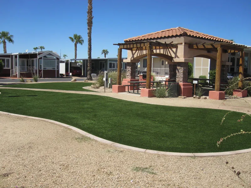 artificial turf in a front yard with a house