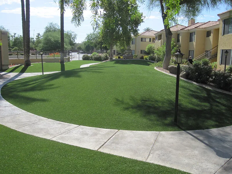 artificial turf in a front yard with a house