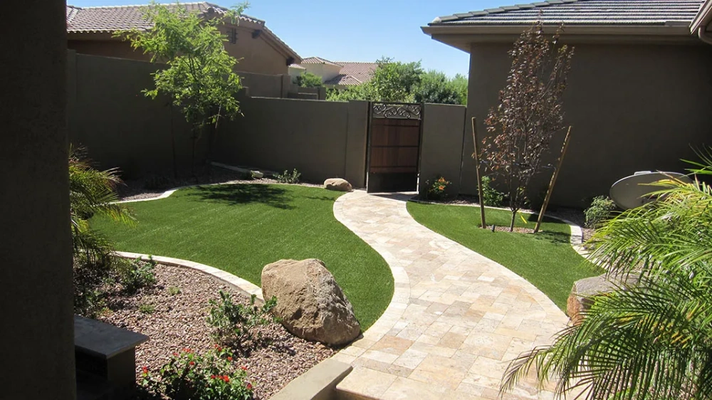 artificial turf in a front yard with a house