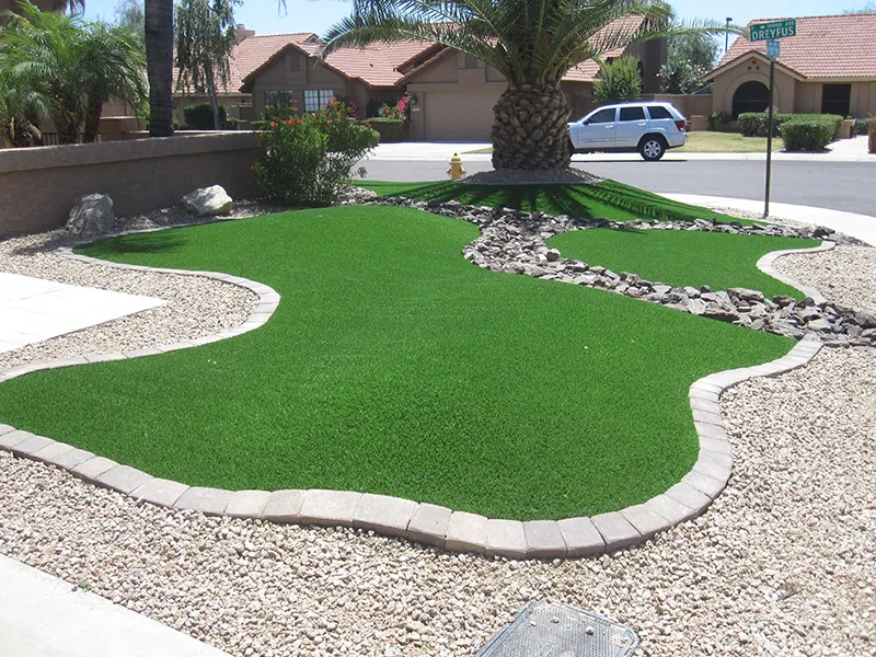 artificial turf in a front yard with a house