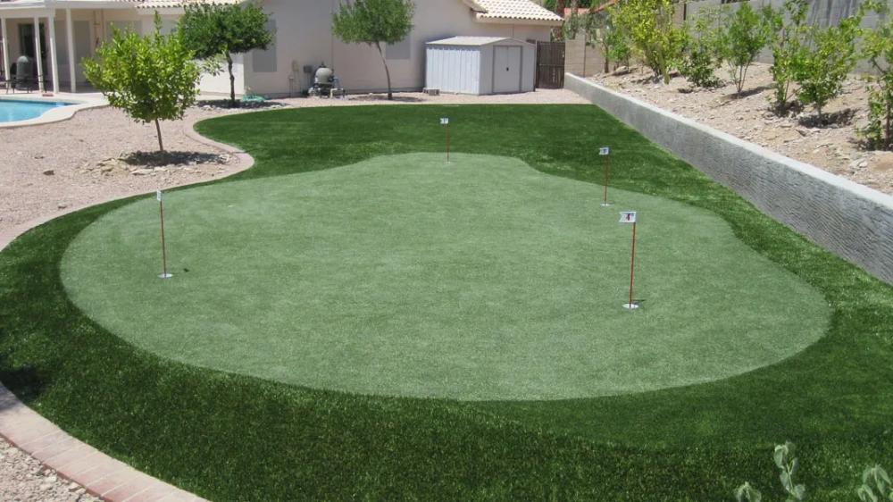 a putting green in a backyard