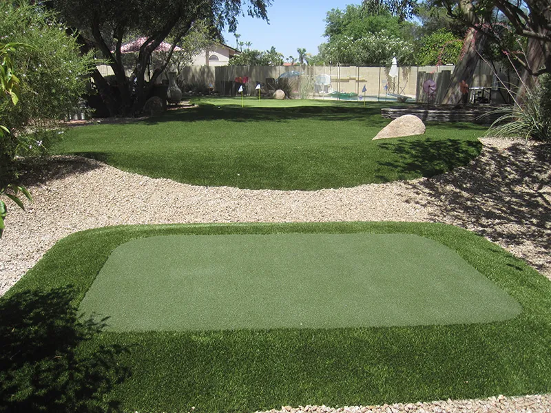 a tee box looking out at a putting green